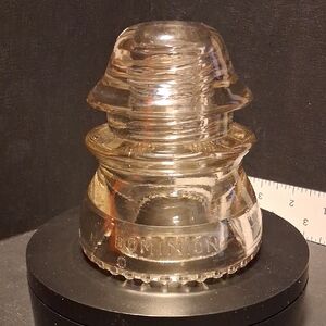 vintage amber-tinted Dominion No. 42 glass insulator